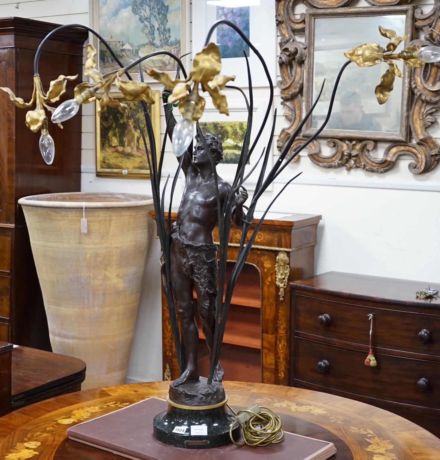 An ornate 19th century style bronze figure and iris table lamp,104 cms high